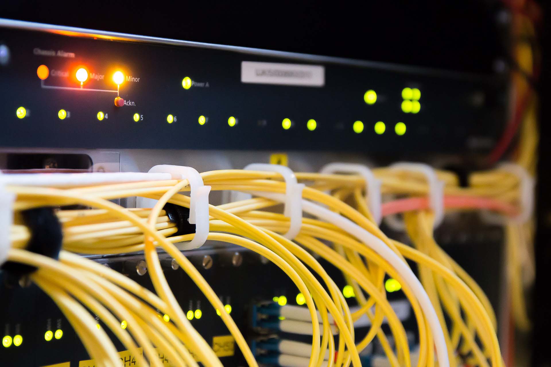 Abstract network of illuminated connections representing IT infrastructure
